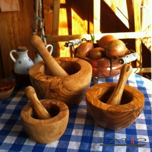 Mortar and pestle out of olive wood - clasic style