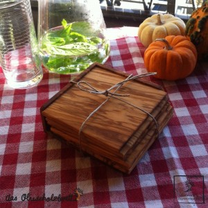 candle holder, round, out of olive wood 