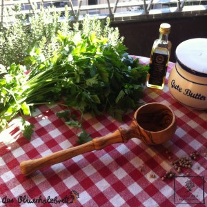 Olive wood spoon to strain sth.