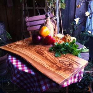 Large chopping board of olive wood