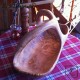 large bowl out of olive wood with a handle
