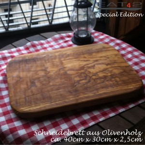 Large chopping board of olive wood